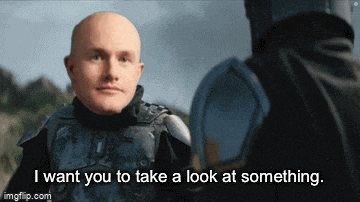 a bald man is talking to another bald man and says i want you to take a look at something .