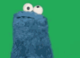 cookie monster from sesame street says suck my on a green background