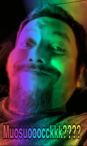 a man with a beard is making a funny face with the words muosuoocckkk?? on the bottom