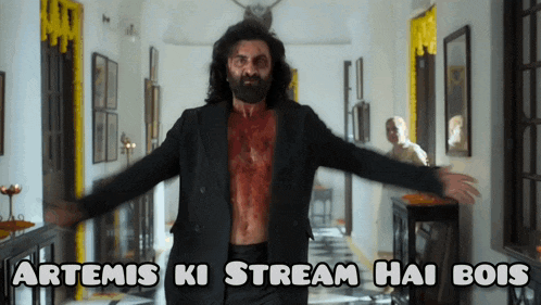 a man with blood on his chest is standing in a hallway with the words artemis ki stream hai bois above him