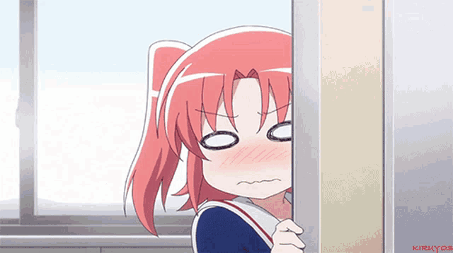 a girl with red hair is peeking out from behind a wall and making a funny face