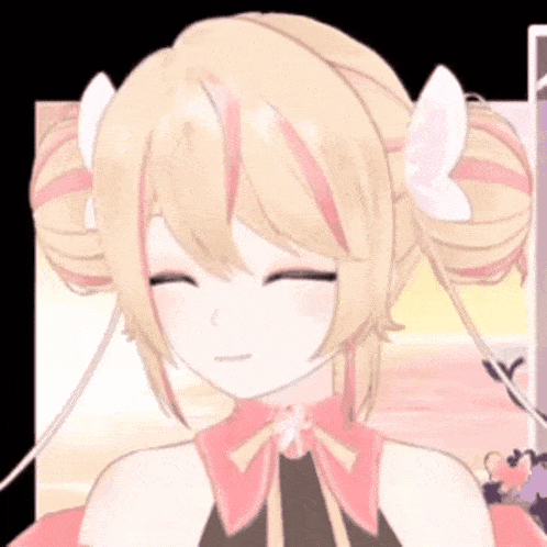 a close up of a girl with blonde hair and a pink bow .