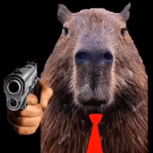 a capybara is pointing a gun at the camera while wearing a red tie .