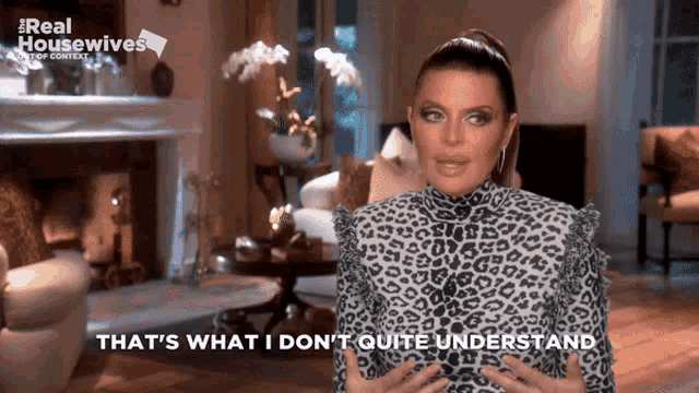 a woman in a leopard print top is saying that 's what i don 't quite understand