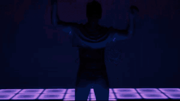 a silhouette of a man in a blue shirt