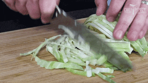 Chopping A Cabbage Chili Pepper Madness GIF - Chopping A Cabbage Chili Pepper Madness Thinly Sliced Cabbage GIFs