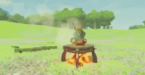 a person is standing on top of a fire in a field with smoke coming out of it .