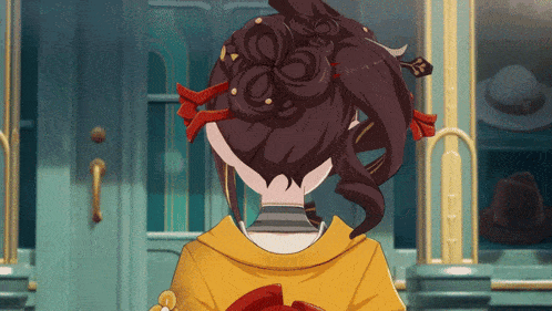 a girl with a bun on her head is standing in front of a door