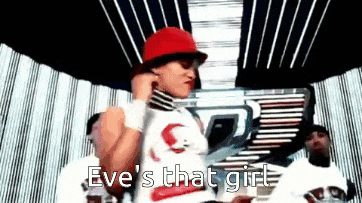 a woman wearing a red hat and a white shirt with the words " eve 's that girl " on it