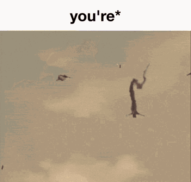 a blurred image of a person flying with the words you 're * above them