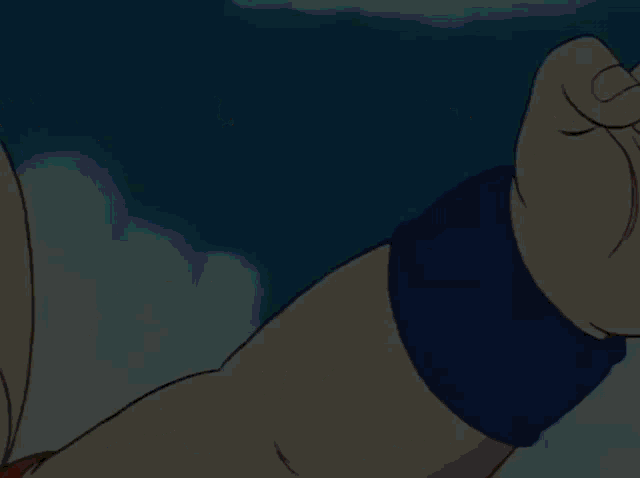 a close up of a person 's arm with a blue wristband on it