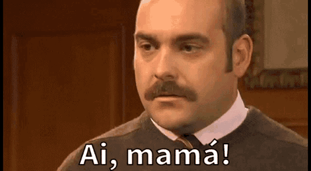a man with a mustache is saying ai , mama