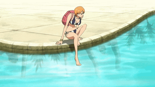 a woman in a bikini is sitting on the edge of a pool