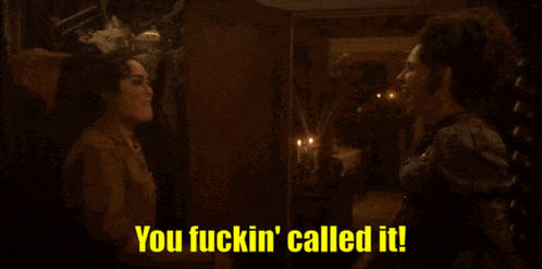 two women are fighting with the words you fuckin ' called it behind them