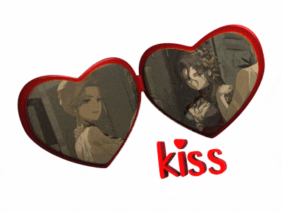 two red hearts with a picture of two women and the word kiss