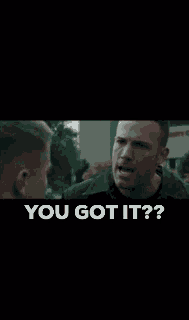 a man is yelling at another man with the words you got it