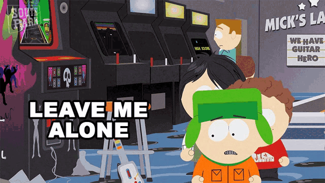 a cartoon character says leave me alone in front of an arcade machine