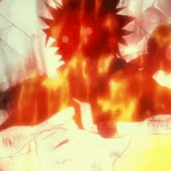 a close up of a person 's face with a fireball in the background