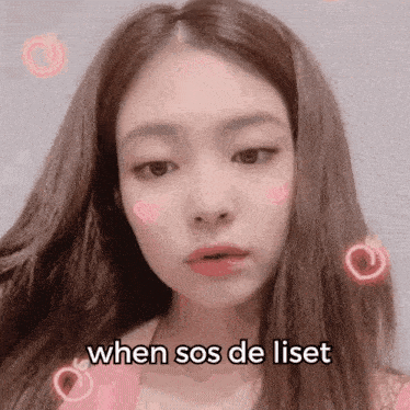 a close up of a woman 's face with the words `` when sos de liset '' written on her face .