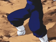 a close up of a person 's leg in a blue pants and white boots .