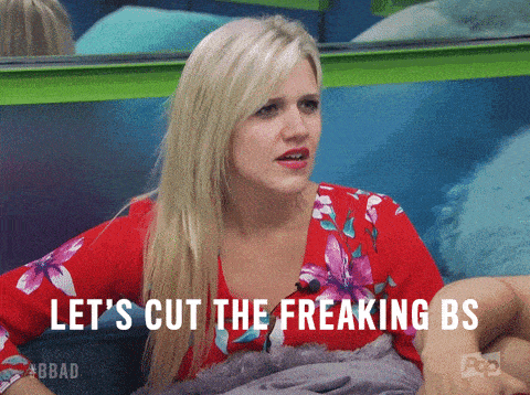 a blonde woman says let 's cut the freaking bs in a red shirt