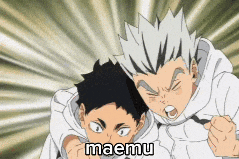 a couple of anime characters are standing next to each other and one of them is shouting .