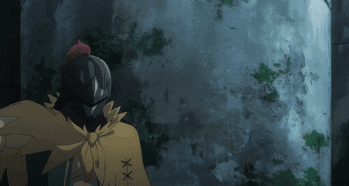 a cartoon character with a helmet and a yellow cape has a x on his chest