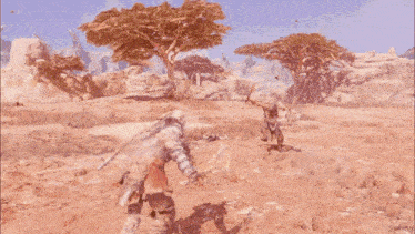 a man in armor is holding a sword in a video game while standing in the desert .