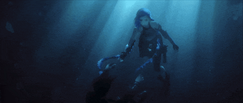 a woman with blue hair is in the water