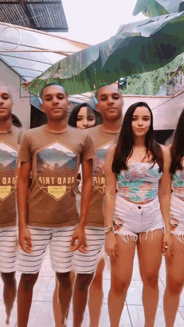 a group of people are wearing shirts that say rio