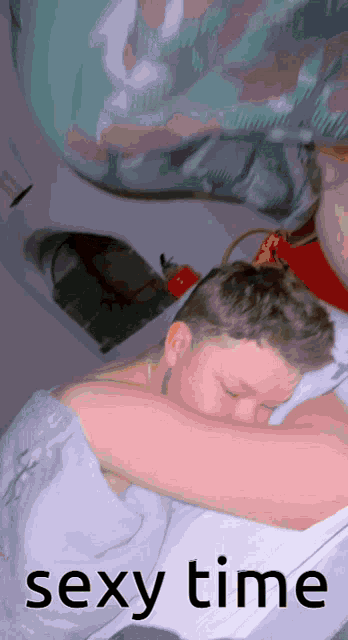 a picture of a man sleeping with the words sexy time underneath