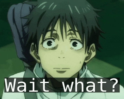 a close up of a person 's face with the words `` wait what '' written above it .