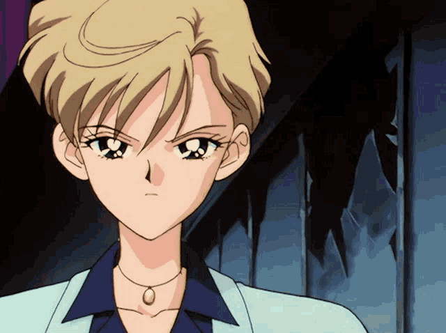 a girl with short blonde hair and a necklace looks angry