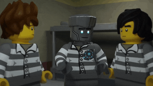three lego figures are standing next to each other in a room