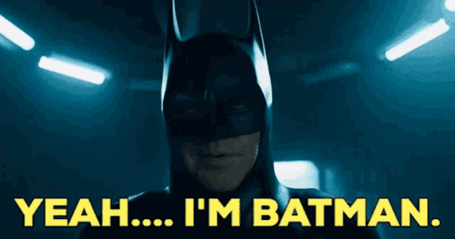 a man in a batman suit says yeah i 'm batman