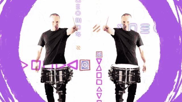 a man in a black shirt is playing drums in front of a purple background