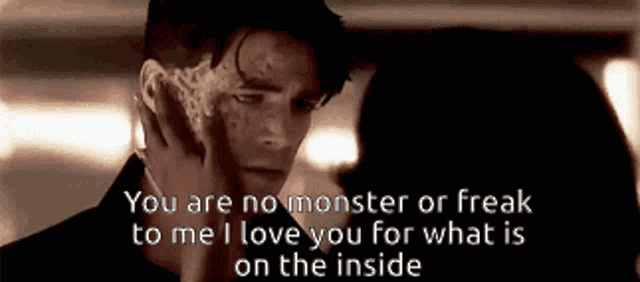 a woman touches a man 's face with a quote that says you are no monster