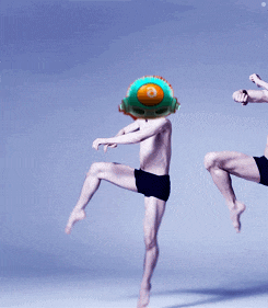 a man with a balloon on his head with the number 8