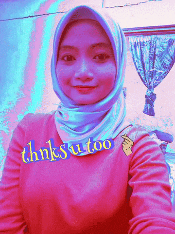 a woman wearing a hijab and a pink shirt with the words thinksu too