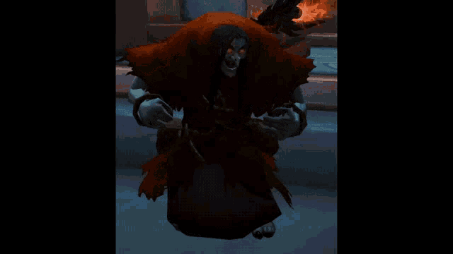 a skeleton in a red robe with glowing eyes is in the dark