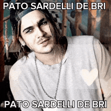 a picture of a man with long hair and the words pato sardelli de bri