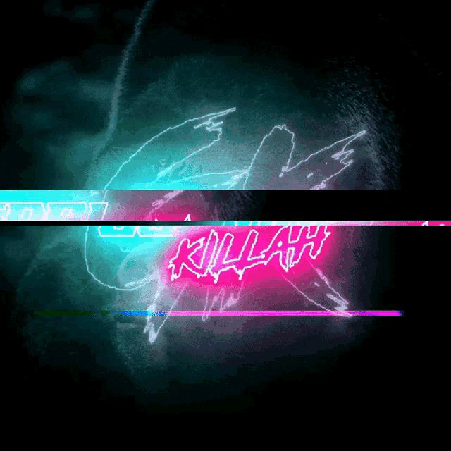a neon sign that says killah is lit up in a dark room