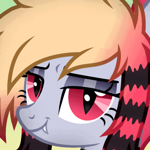 a close up of a pony 's face with red and black hair