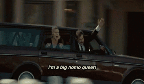 a man in a suit says i 'm a big homo queer in a car