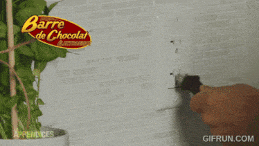 an advertisement for barre de chocolat shows a person plugging in a cord