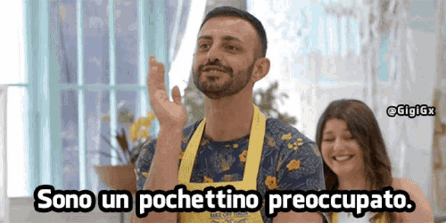 a man in a yellow apron says sono un pockettino preoccupato