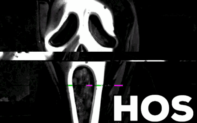a black and white photo of a man standing in front of a building with the word hos in white