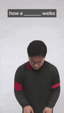 a man wearing glasses stands in front of a white background with the words how a walks above him