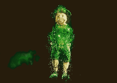 a green leprechaun is surrounded by green sparkles on a black background .
