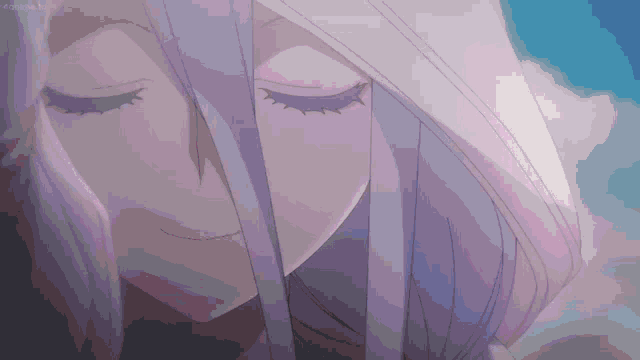 a close up of a person 's face with their eyes closed .